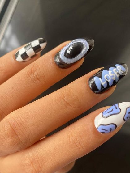 This set is all about expressing yourself. From the hand-lettered graphic to the abstract cow print, every nail tells a part of the story.