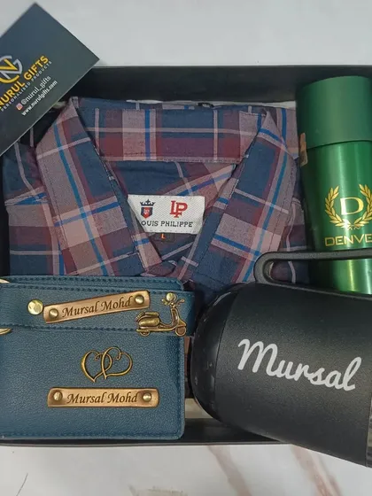 Another angle of the 5-piece personalized gift hamper, showing the custom mug, wallet, keychain, shirt, and deodorant.