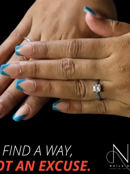 This geometric French tip in a bold blue is for the client who wants something modern and different. The sharp, angular lines give this classic style a contemporary edge.