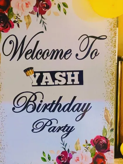 A custom floral welcome board for Yash's birthday party.