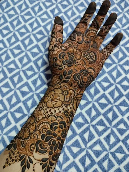 A full-coverage design with a beautiful mix of flowers and paisleys, showing how intricate patterns can create a stunning overall effect.