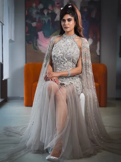 A vision in silver and sparkle. For this shoot with Aaditi Pohankar, I created a high-glam look with shimmering eyeshadow, flawless skin, and a soft lip, perfectly matching her ethereal, caped gown.