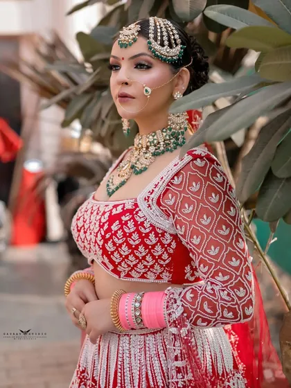 A three-quarter portrait of the bride in an outdoor setting, with natural light beautifully illuminating her features.