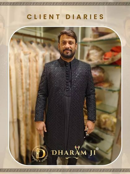 A client looking elegant in a classic black sherwani with subtle self-embroidery. A timeless choice for any formal event.
