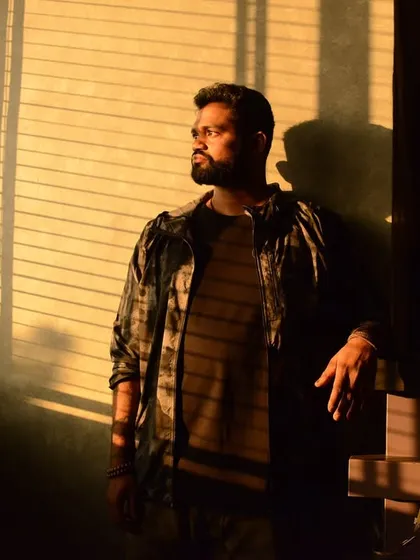 A quiet, contemplative portrait of me in the golden hour light, showing a different, more introspective side.