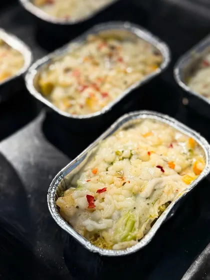 My Dhokla Lasagna is a creative fusion of Gujarati and Italian cuisines. Fluffy dhokla is layered with cheese and baked like a lasagna, creating a savoury, cheesy, and unique dish.