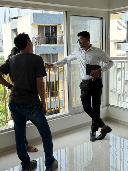 A meeting with clients in their new, empty apartment. This is the beginning of our journey to turn this space into their dream home.