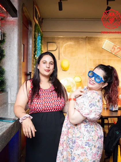 Posing for a picture with fun props, our guests are always ready for a good time. We provide the backdrop for fun, memorable nights out with friends.