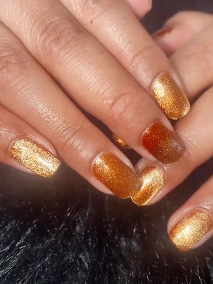 A close-up of the warm, autumnal maple cat eye shade.