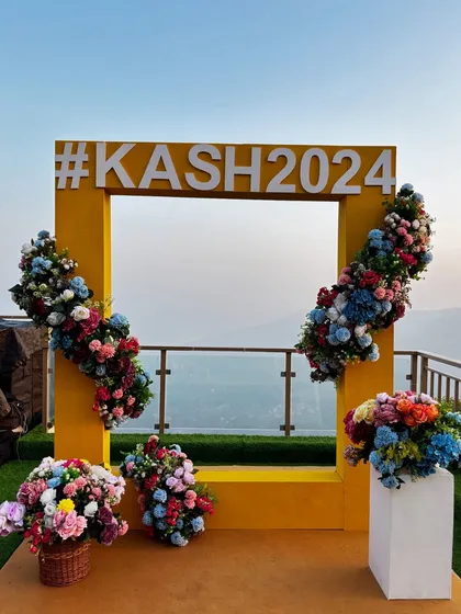 We love adding personal touches that make your event uniquely yours. This custom-made selfie booth with the couple's wedding hashtag became a huge hit, offering guests a fun spot to capture memories against a stunning scenic backdrop.