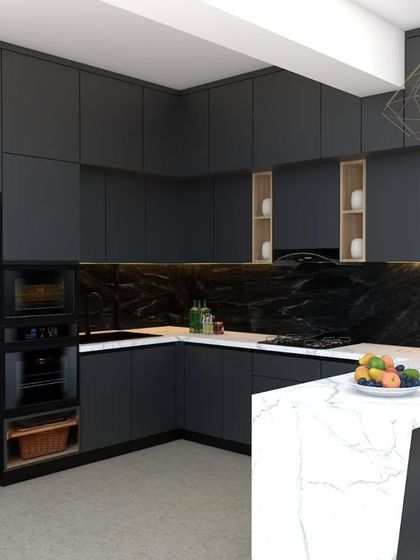 A close-up render of a dark, sophisticated kitchen design. This image focuses on the contrast between the matte black cabinets, the rich marble backsplash, and the functional breakfast bar, showcasing a space designed for both cooking and socializing.