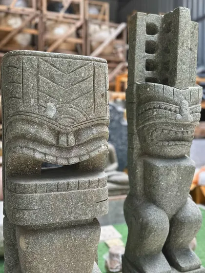 Another detailed shot of our Tiki statue, focusing on the expressive, carved face. This piece is perfect for adding an element of tribal art and bold design to your home or garden.