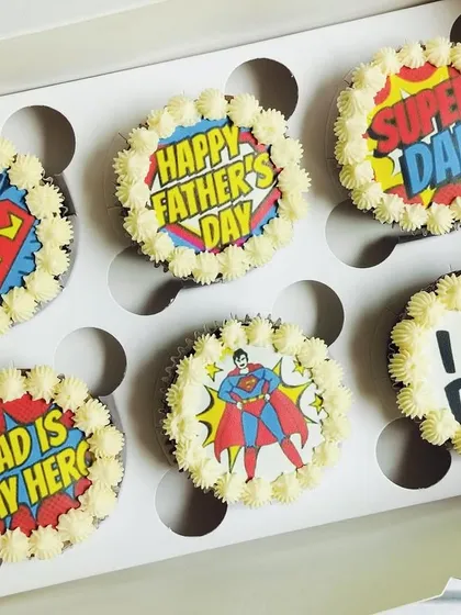 Celebrate the hero in your life with my special Father's Day cupcake collections. This set features fun, comic book style edible prints with messages like "Super Dad" and "Dad is my Hero," all framed with classic vanilla buttercream piping on a rich chocolate base.