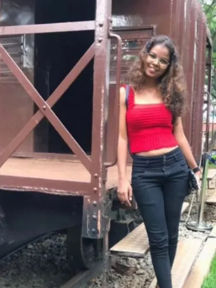 A client looking stylish in her custom red crochet crop top. I can make these tops in any color and size.
