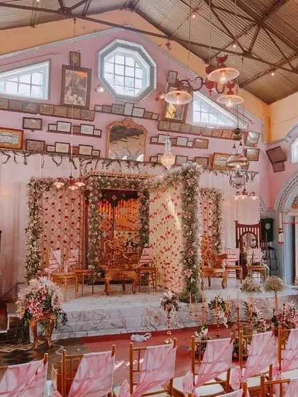 This destination wedding in Ooty showcases our ability to enhance a venue's natural character. We designed a grand yet intimate ceremony space within a heritage hall, using floral arrangements and elegant seating to complement the venue's unique architecture.