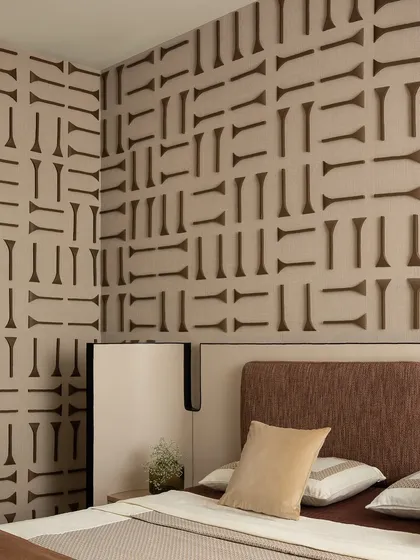 The finished 3D wooden wall panel in the son's bedroom of the 'ARAH' project. Each piece was individually crafted and placed to create this stunning, graphic pattern.