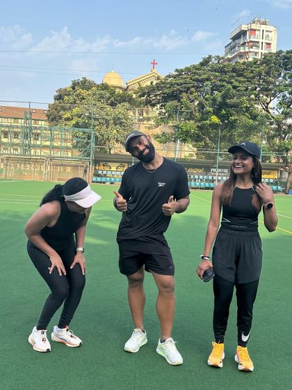 It's not all serious faces. We have fun during our bootcamps too. A lighthearted moment with clients after a tough session.