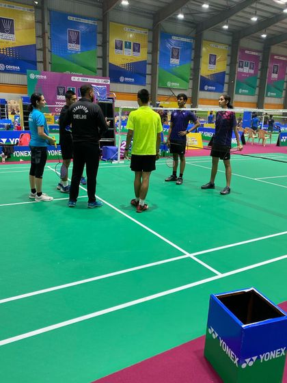 Briefing the players before a crucial match at the nationals. We discuss the game plan, opponent's weaknesses, and key strategies to focus on.