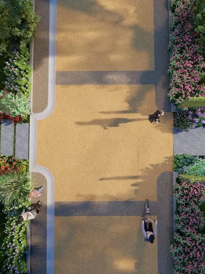 An aerial concept view of a wide, pedestrian-friendly promenade in our Sakleshpur project. The design uses contrasting paving materials and is lined with flowering shrubs to create a beautiful and functional circulation spine.