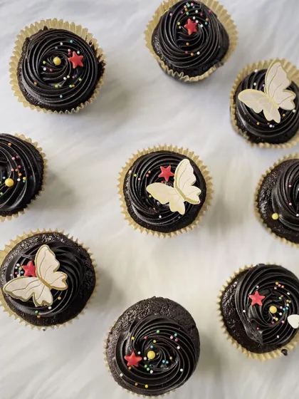 Our rich, whole-wheat chocolate cupcakes offer a guilt-free indulgence. Topped with silky chocolate frosting, delicate sprinkles, and edible butterflies, they are as beautiful as they are delicious.