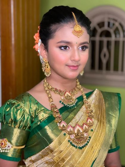 A close-up portrait of this young client, with soft, age-appropriate makeup.