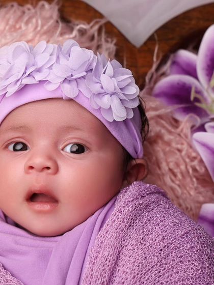 A precious close-up of the baby's awake and expressive face. So much personality in such a tiny person!