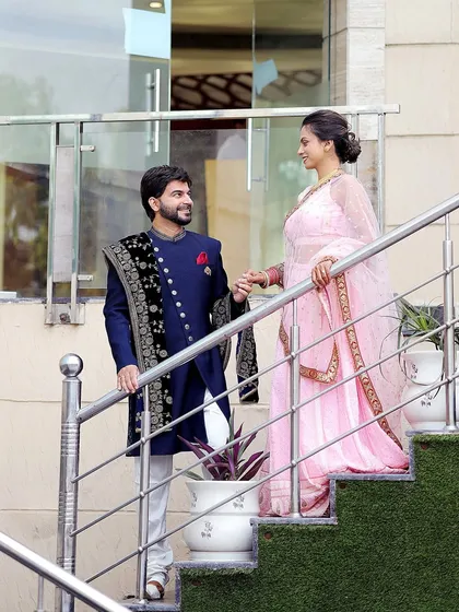 A candid moment on the stairs. I look for interesting angles and settings to make every photo in your pre-wedding shoot unique.