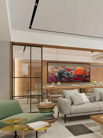 This living room features multiple layers of design, integrating diverse shapes, colors, and patterns to achieve a harmonious balance. Despite the dynamic elements, we maintained a cohesive color scheme to ensure an underlying simplicity, creating a sophisticated and visually engaging space.
