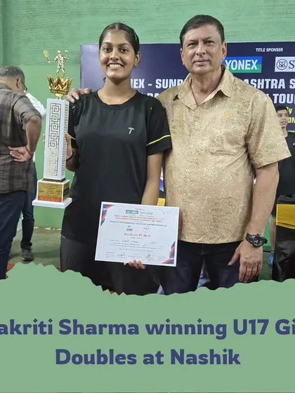 Prakriti Sharma receiving her U17 Girls Doubles trophy in Nashik, her second state title of the year.