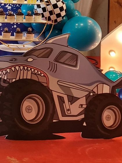 A unique monster truck shark prop for a vehicle-themed party. I love creating custom and imaginative props to match any theme you can think of.