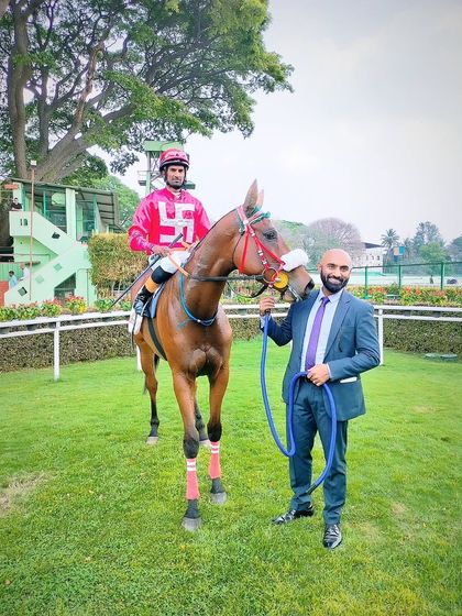 N R I Ace, with jockey Antony Raj S., after a successful race.