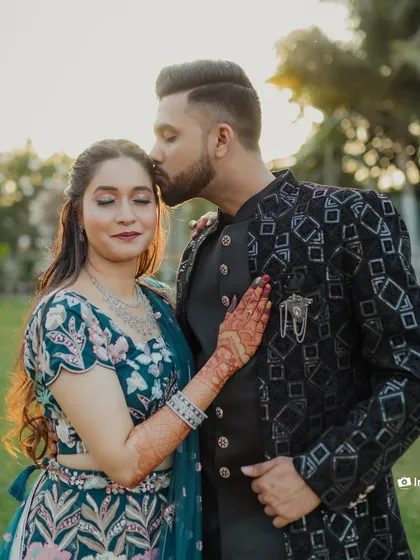 This series of photos captures a stylish couple during their Sangeet. From a romantic forehead kiss to playful poses, these shots showcase their beautiful coordinated outfits and happy connection.
