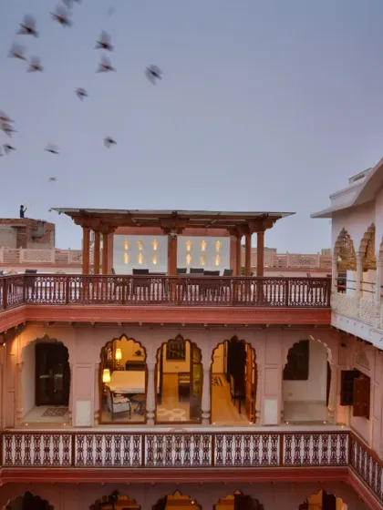 A view of the haveli's main terrace, offering panoramic views of Chandni Chowk's iconic landmarks. This space was designed not just for relaxation but to immerse guests in the rich historical context of Old Delhi.