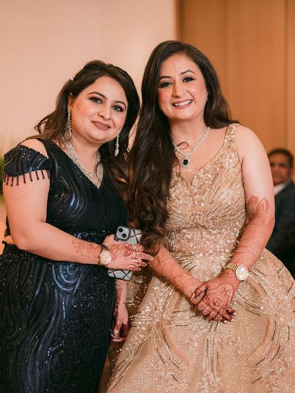 A candid moment with family. The makeup is designed to look fresh and beautiful throughout the long wedding day.