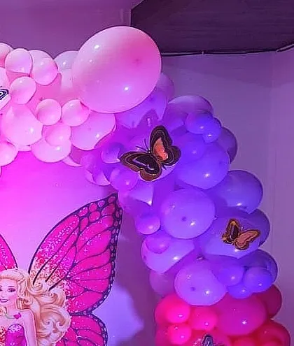A close-up of the balloon details from the butterfly fairy theme, showing how different shades of pink and purple are blended.