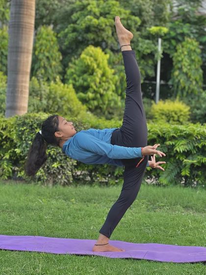 This Pratyanchyasana variation is a standing balance pose that requires incredible leg strength and flexibility. This young yogi makes it look effortless.
