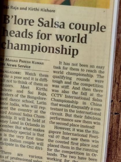 This news clipping announces our journey to the World Salsa Championship in Orlando. It highlights the tough qualifying rounds and our first-place win at the Singapore International Festival that got us there.