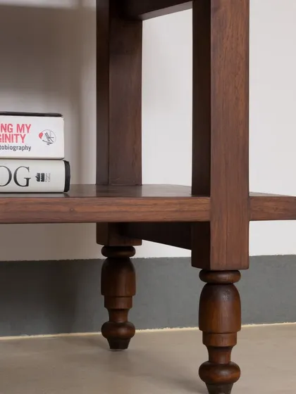 The Chinmayi Open Bookshelf is a charming and playful addition to any room. Its petite size and adorable design make it perfect for displaying your favorite books and decor items.