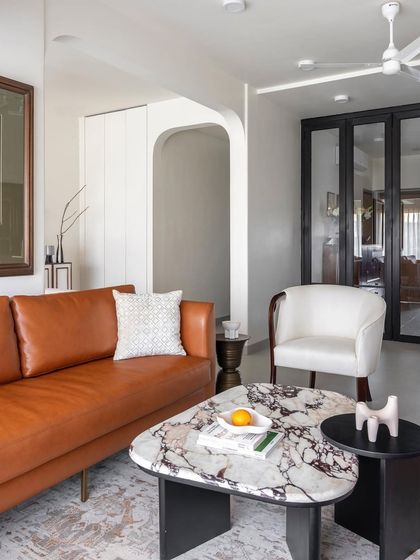 Each piece in this home is custom designed to look geometric and abstract, almost architectural. Subtle details and materiality amplify the home’s honest character and feel. Our idea was to create a well-balanced and harmonious space, and our designs reflect the clients’ personalities, so each is unique. Bold décor elements are carefully laid against muted white and grey backdrops, balancing opulence and finesse, heritage and modernity.