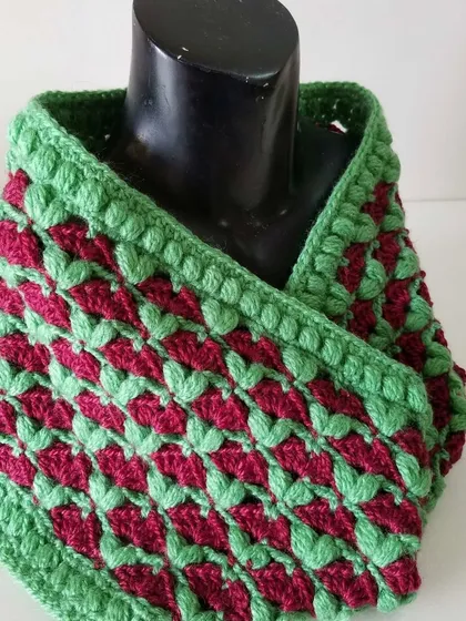 This is the Cardamom Blossoms cowl, a pattern I designed and shared on my blog. The textured stitch is cozy and warm, and the two-color design makes the pattern pop.