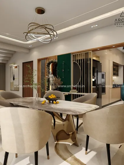 I believe a dining area should be a masterpiece of its own. Here, a marble-top table, plush seating, and artistic lighting come together to create a space for memorable meals and conversations.
