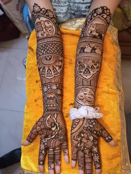 A traditional design with bands of elephants and other symbolic motifs covering the arms.