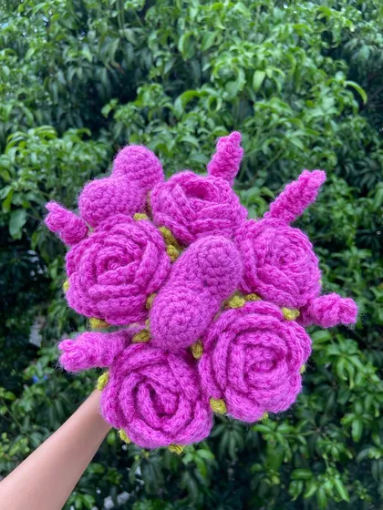 A unique custom bouquet in a vibrant magenta color.