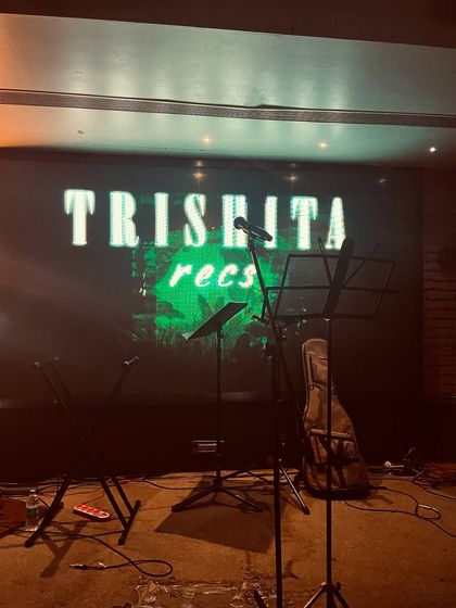 The stage is set with my name in lights. This is a great branding shot that shows the professional setup for my solo shows.