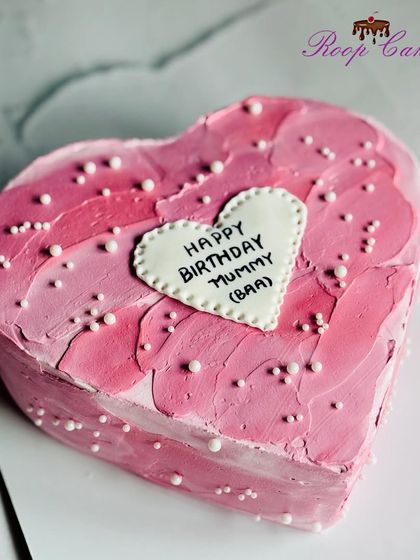 A lovely pink heart-shaped bento cake with a textured finish, perfect for Mummy's birthday.