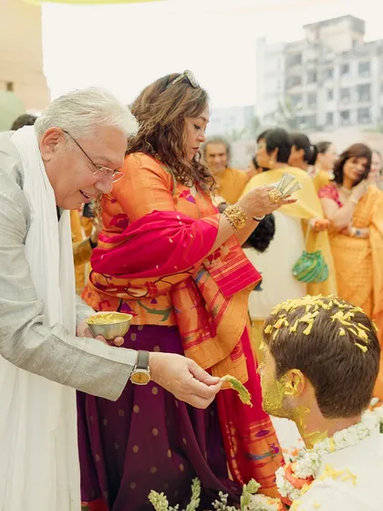 A moment of blessing during the haldi ceremony. We ensure that amidst all the fun, the sanctity and emotional depth of the ritual are beautifully preserved.