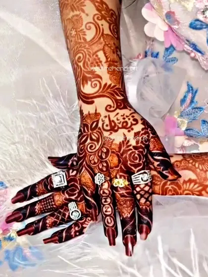 An engagement design with the couple's names written in elegant Arabic calligraphy.