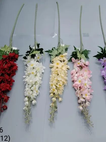 More color varieties of our long-stemmed artificial flowers, including red, white, yellow, pink, and purple.