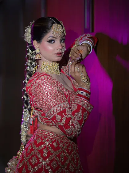A full profile of the Sikh bridal look, showcasing the beautiful braided hairstyle and traditional jewellery.