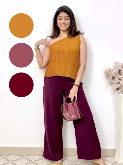 This outfit showcases a beautiful combination of mustard, dusty rose, and burgundy. The colors are all within the same warm family, creating a rich and cohesive look.